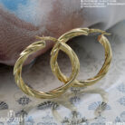 Boucles d’oreilles créoles en or 18K – Élégance et brillance | Bijouterie Bouzid