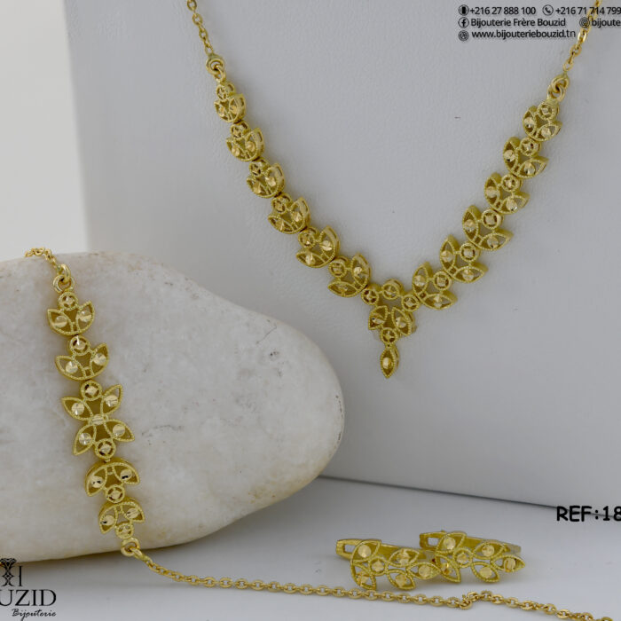 Parure florale en or jaune 18K au design raffiné ✨ | Bijouterie Frères Bouzid